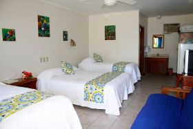 Holiday Hotel San Pedro Belize beachfront room – Best Places In The World To Retire – International Living